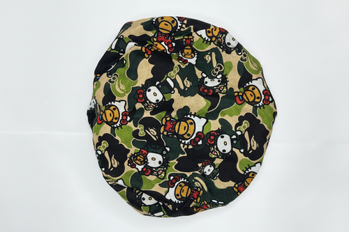 Hello Kitty camo scrub cap top view showing full print