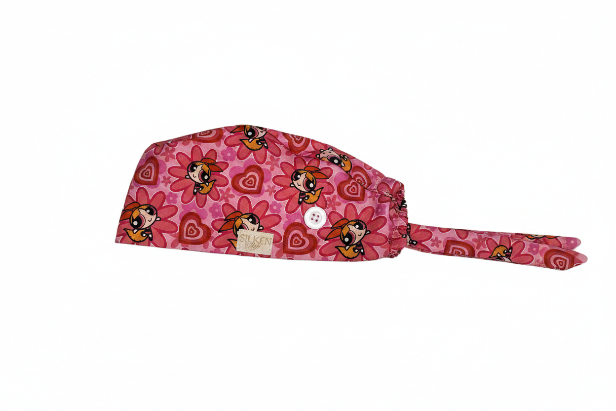 Powerpuff Girls scrub cap side view with pink satin lining and button loop